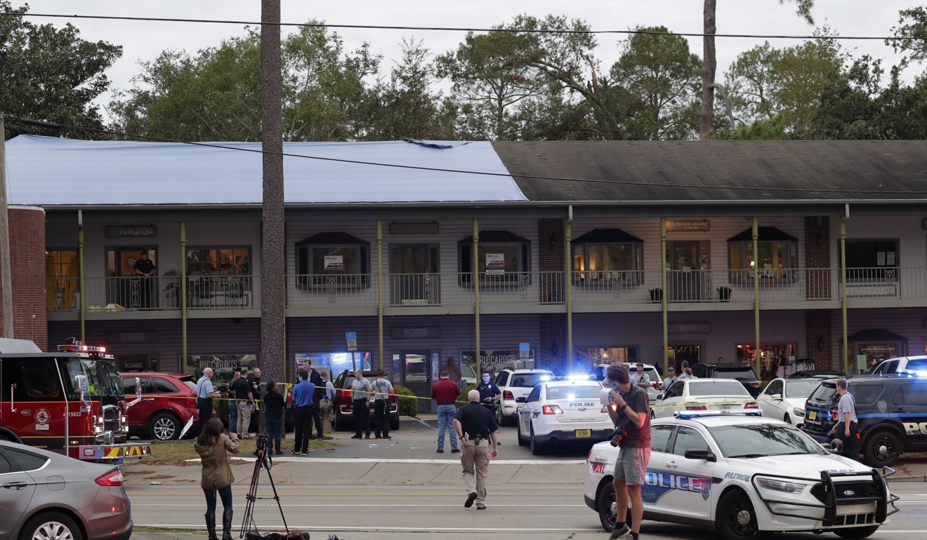 Police at the scene of the shooting. Photo: AP