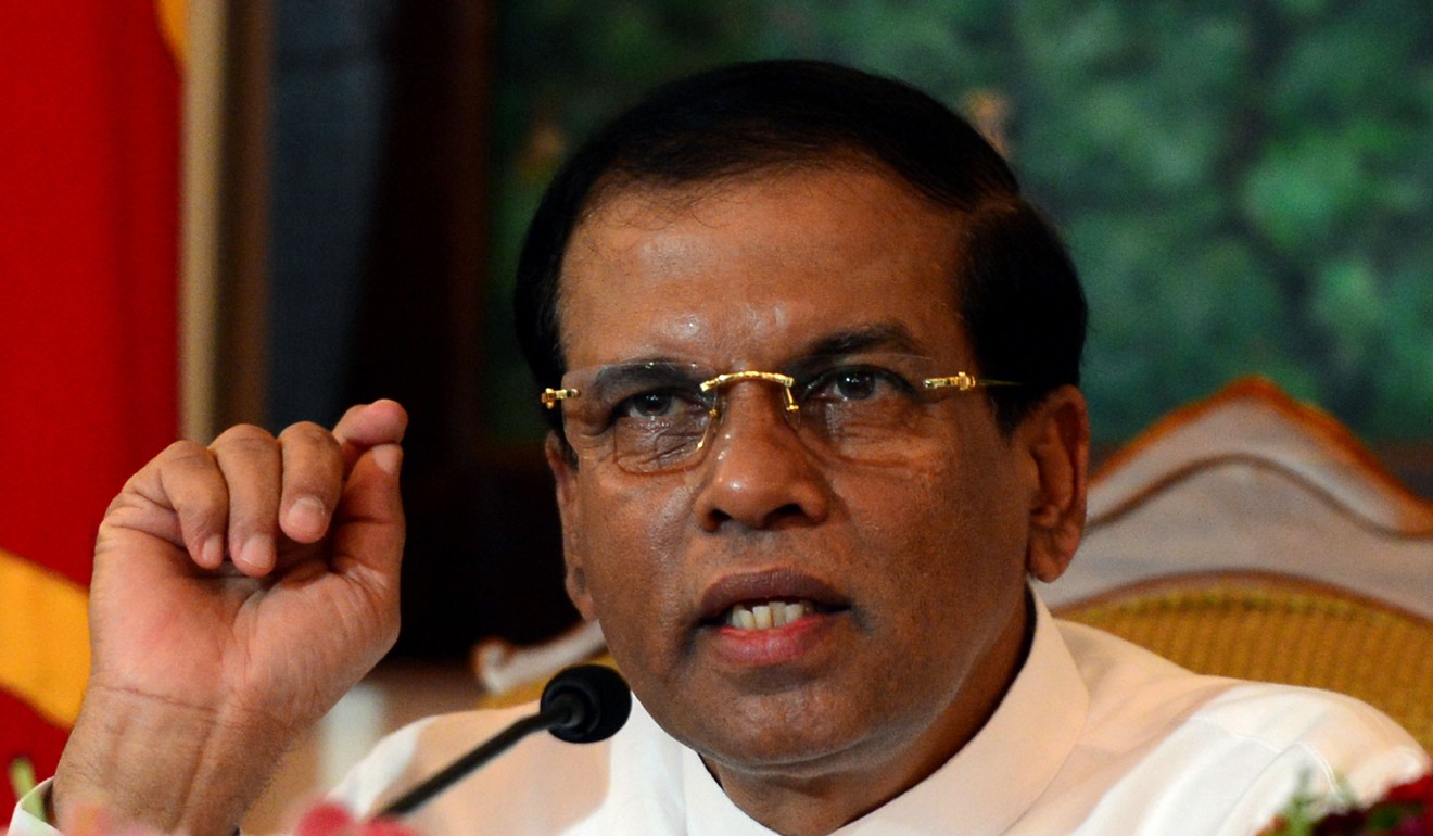Sri Lankan President Maithripala Sirisena makes a televised statement from his official residence in Colombo. Photo: AFP