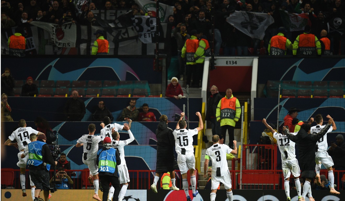 Juventus players celebrate with their supporters after the Champions League group H win over Manchester United last month. Photo: AFP