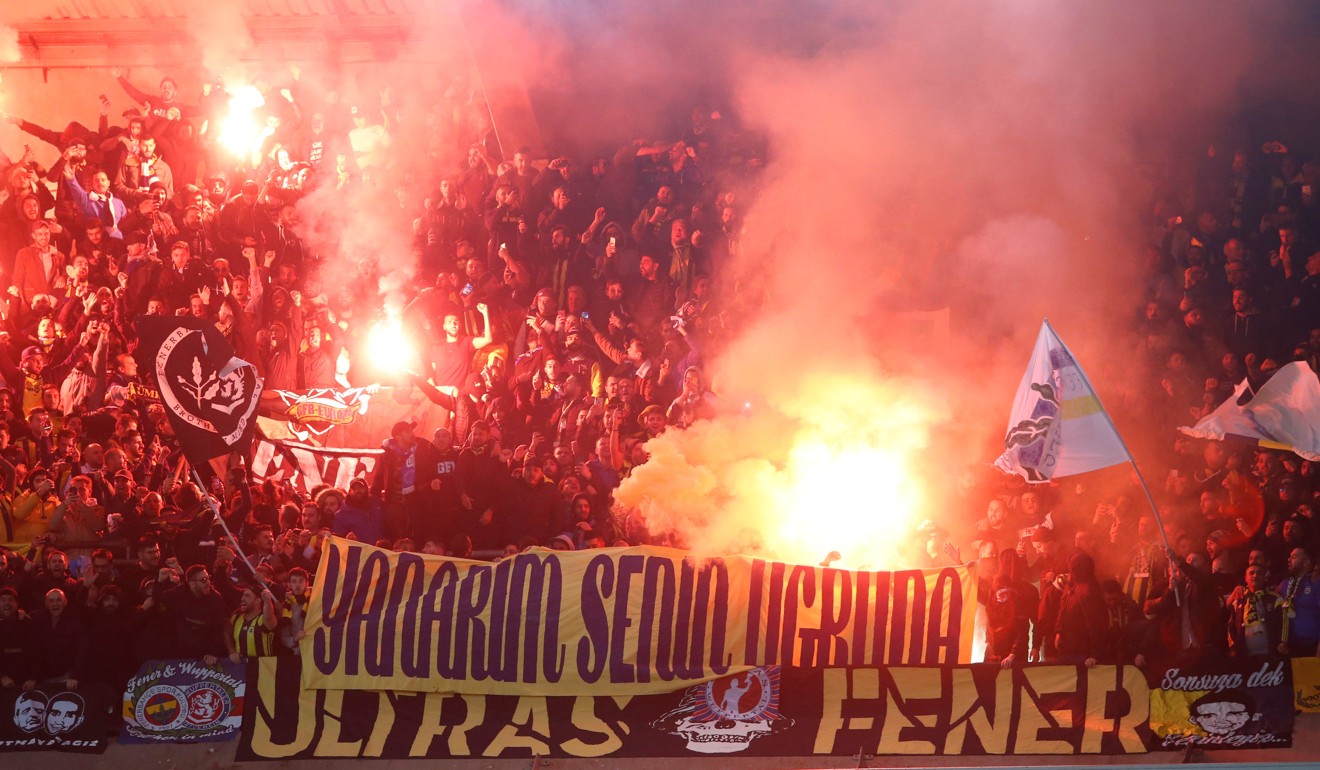 Fenerbahce fans let off flares and display banners before their Uefa Europa League match with Anderlecht. Photo: Reuters
