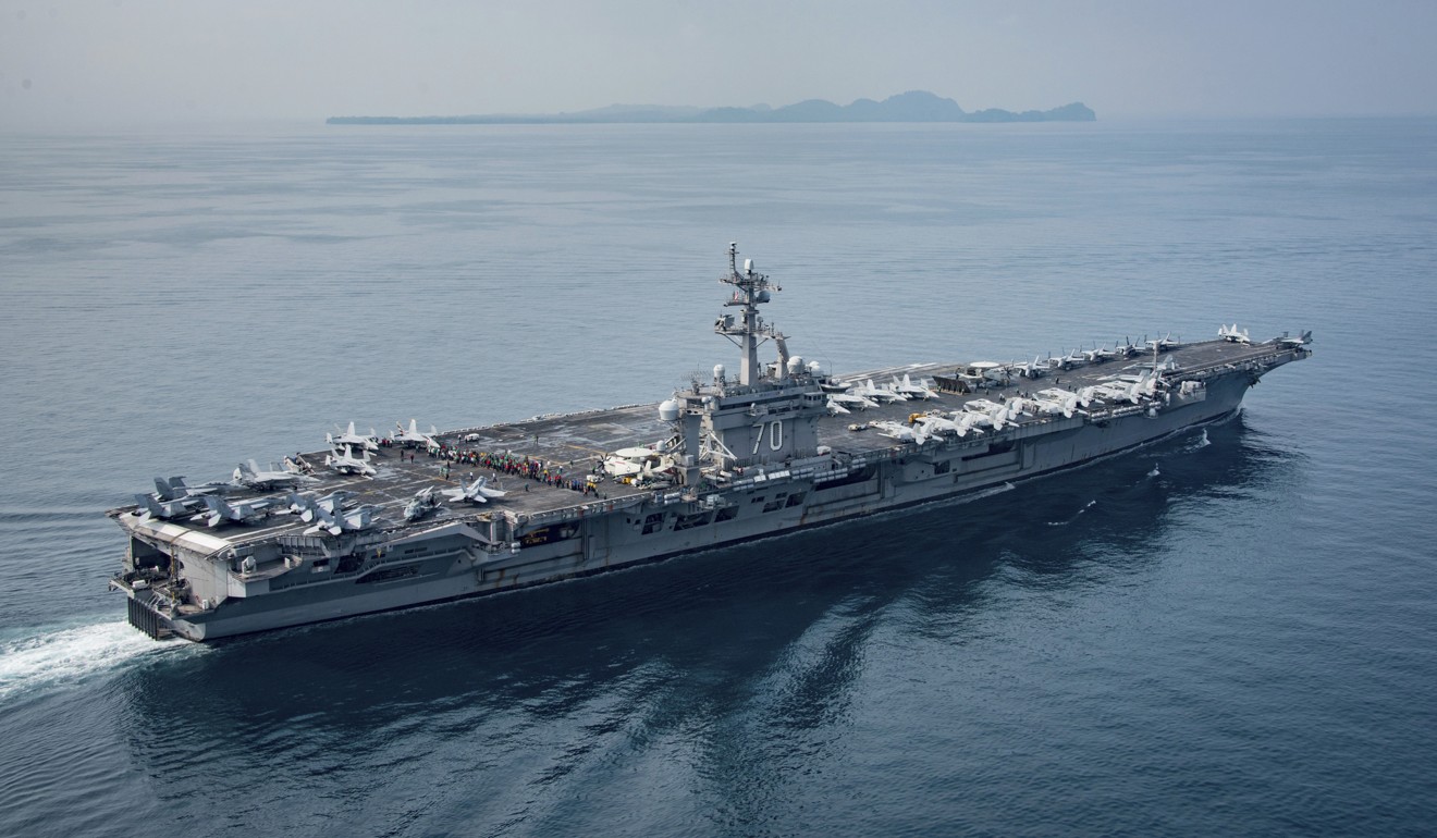 The US has sent aircraft carriers USS Carl Vinson (pictured) and USS Ronald Reagan to the Pacific and says it is continuing to test free navigation of the South China Sea. Photo: AP