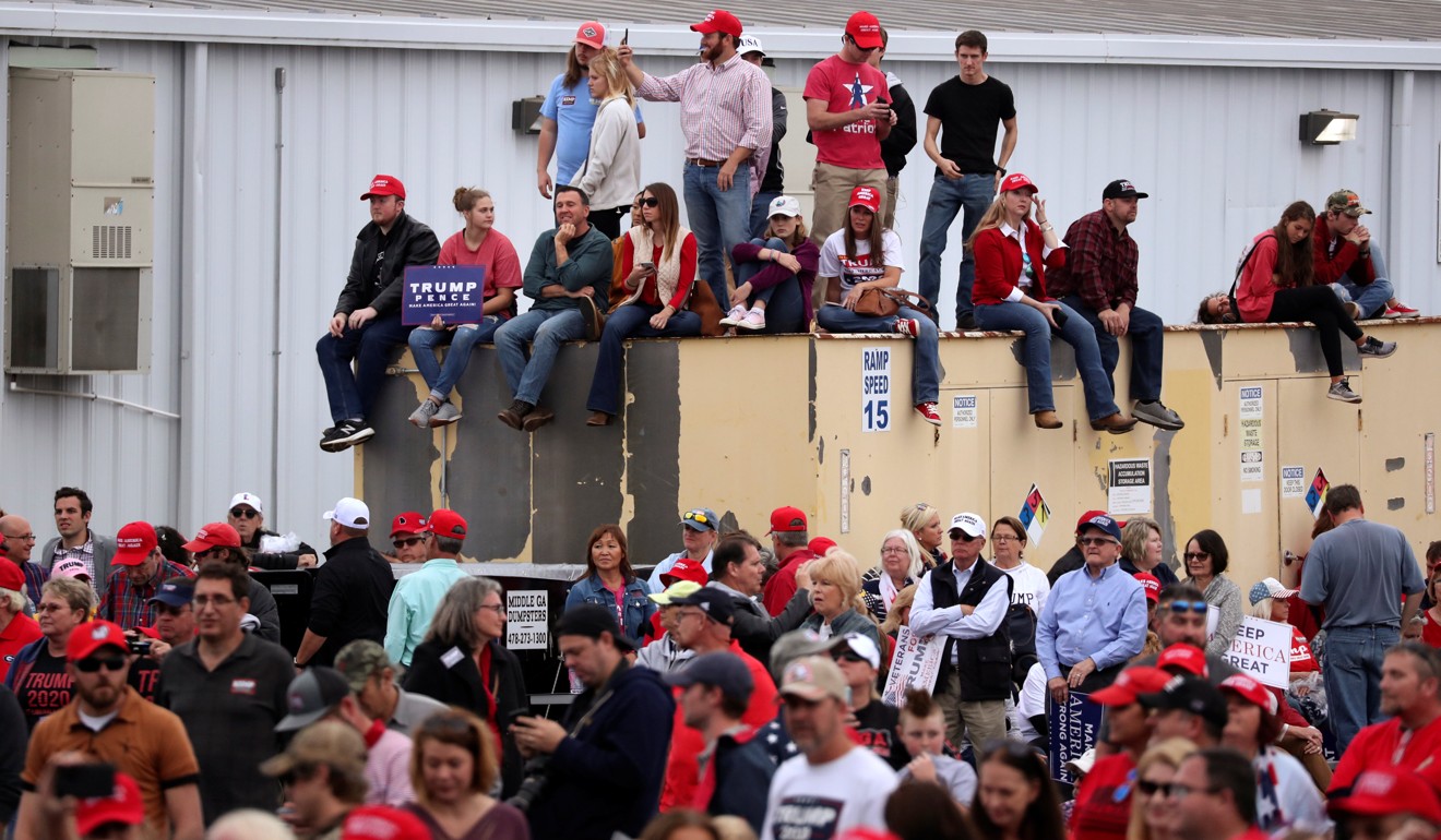 Supporters waiting for Trump at Middle Georgia Regional Airport in Macon, Georgia. Photo: Reuters