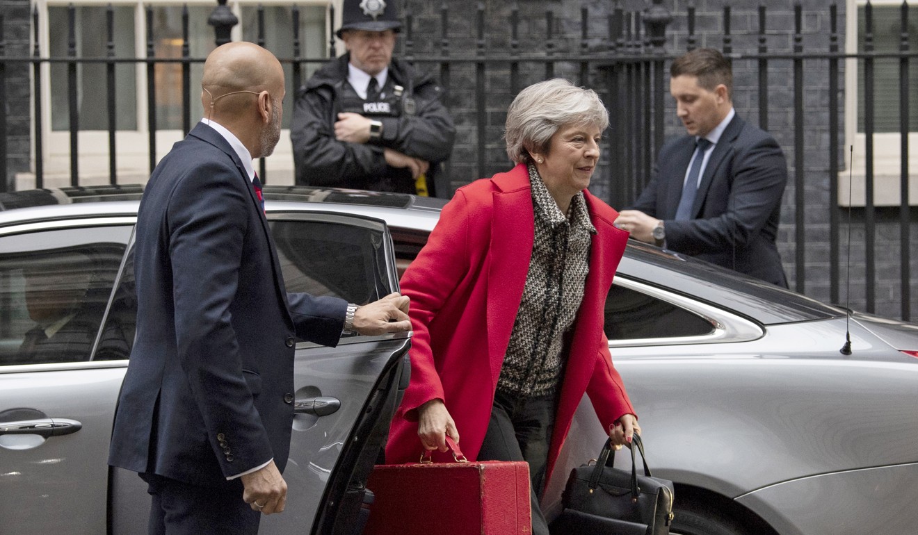 British Prime Minister Theresa May arrives in Downing Street on November 16. The unveiling of the draft Brexit agreement last week prompted multiple cabinet ministers to quit, as well as calls for May’s resignation, which she has thus far resisted. Photo: EPA-EFE