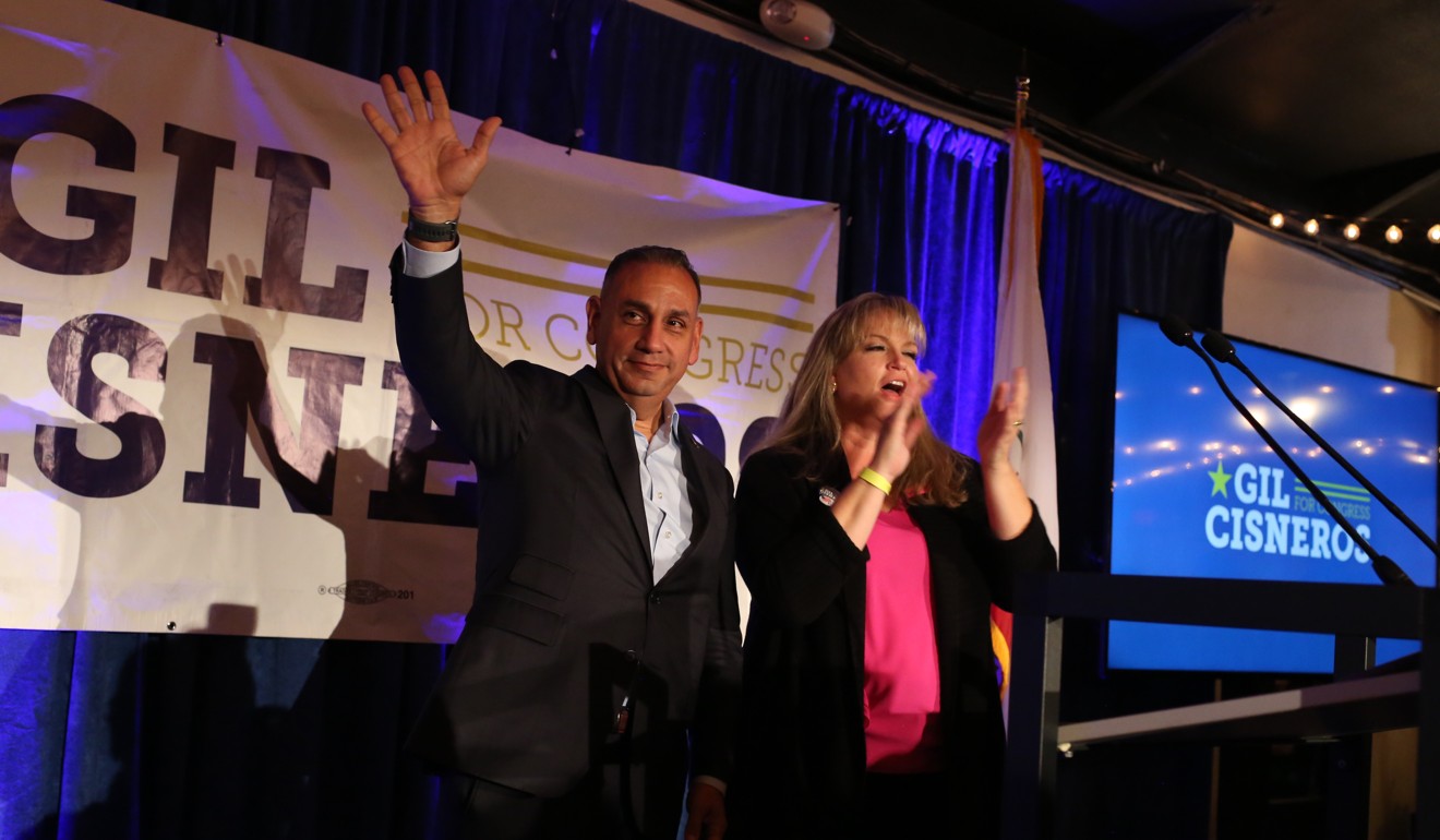 Gil Cisneros, the Democratic candidate for California’s Congressional District 39, with his wife Jacki at an election night rally in Fullerton on Tuesday. The race will not be decided until the mailed-in ballots are counted. Photo: Dania Maxwell/Bloomberg