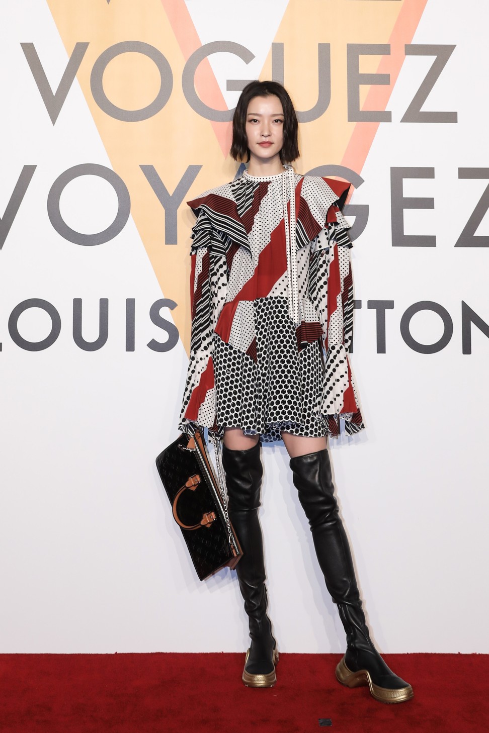 Kris Wu, Sophie Turner and Alicia Vikander turn up to open Louis Vuitton's  glitzy 'Volez, Voguez, Voyagez' exhibition in Shanghai