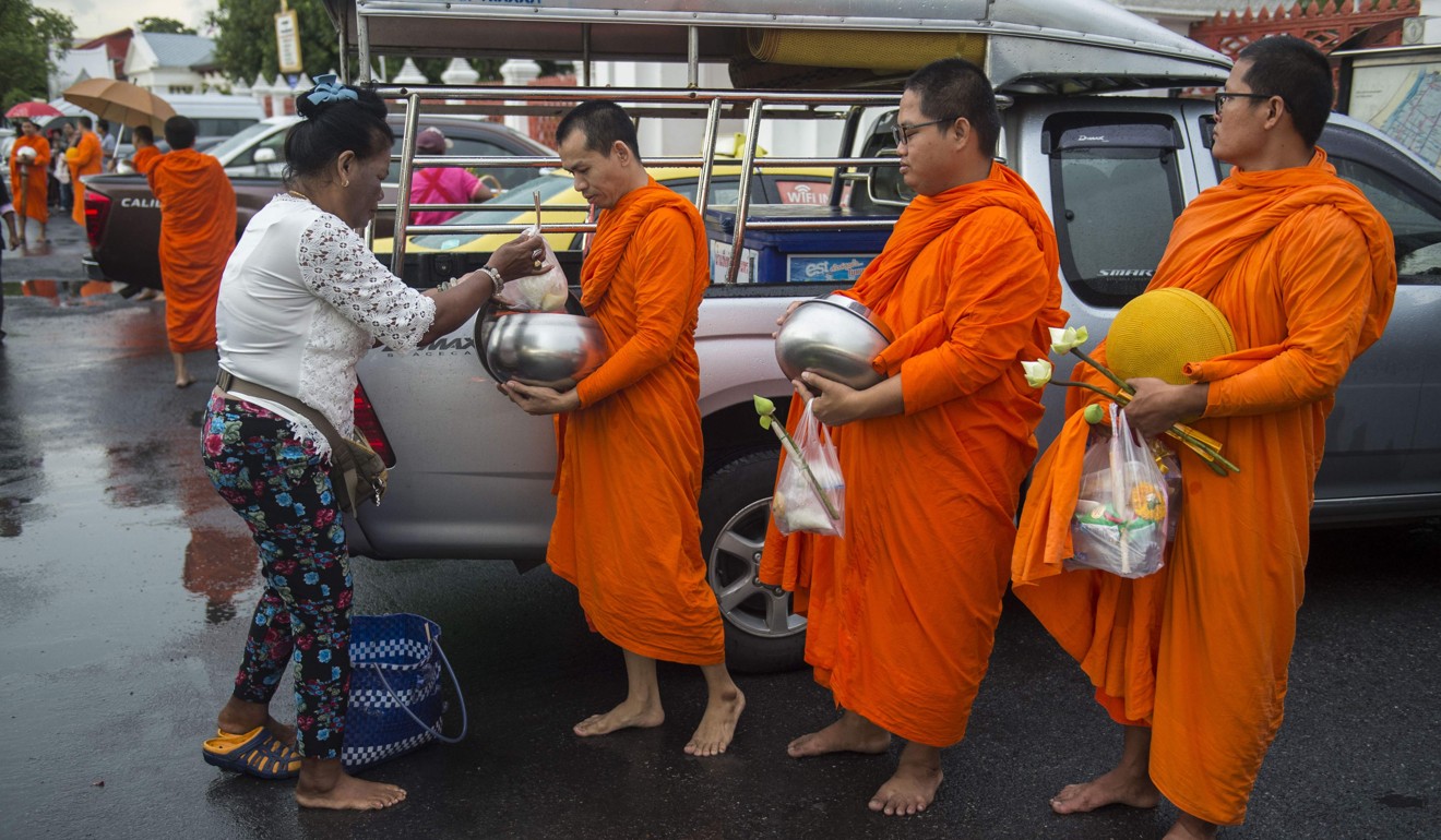 Followers have been showering monks with foods loaded with sugar, fat and oil. Photo: AFP