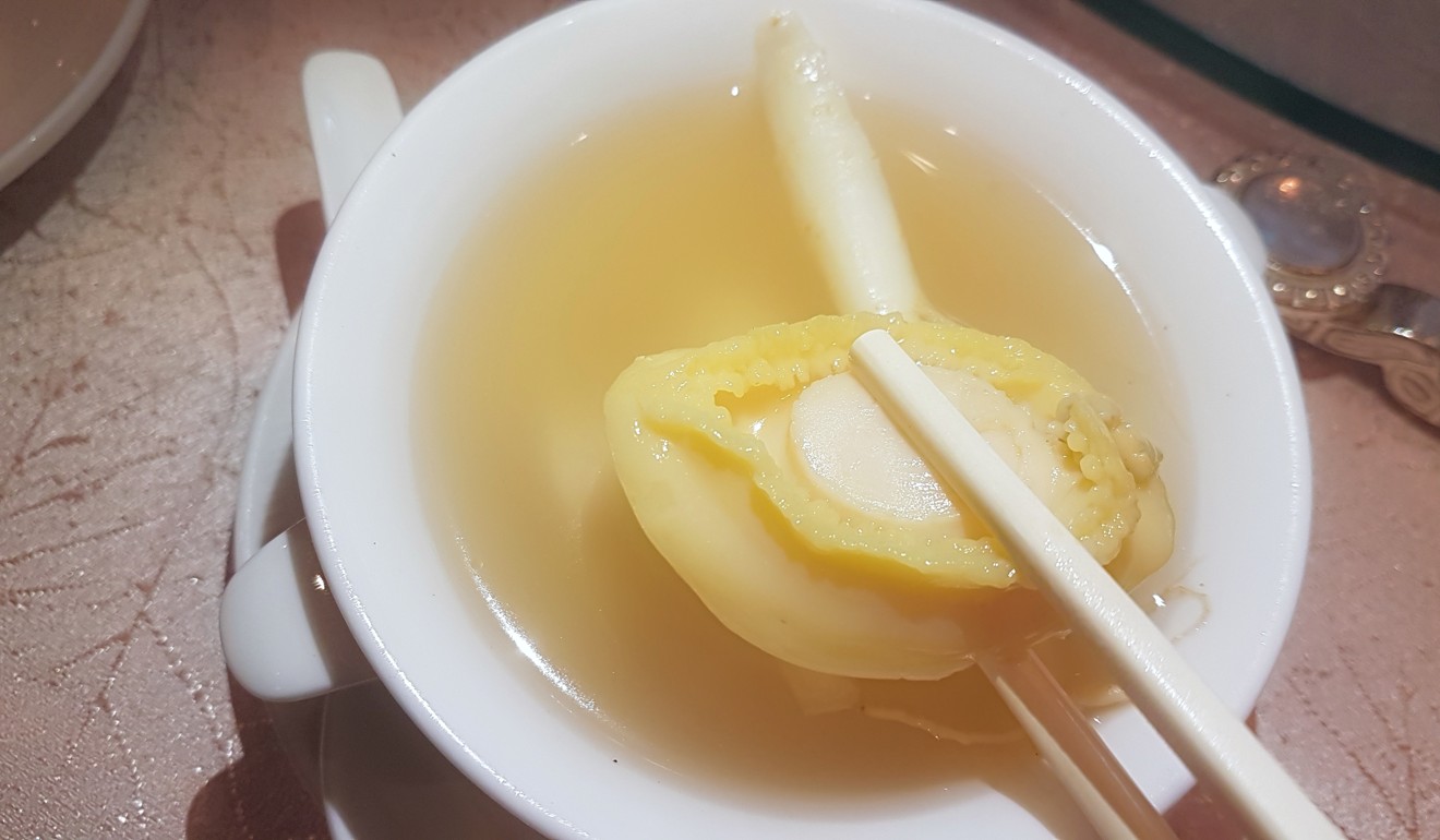 Nourishing double boiled abalone soup with ginseng served at Shang Palace, Shangri-La Hotel, Kuala Lumpur, in Malaysia. Photo: Cedric Tan