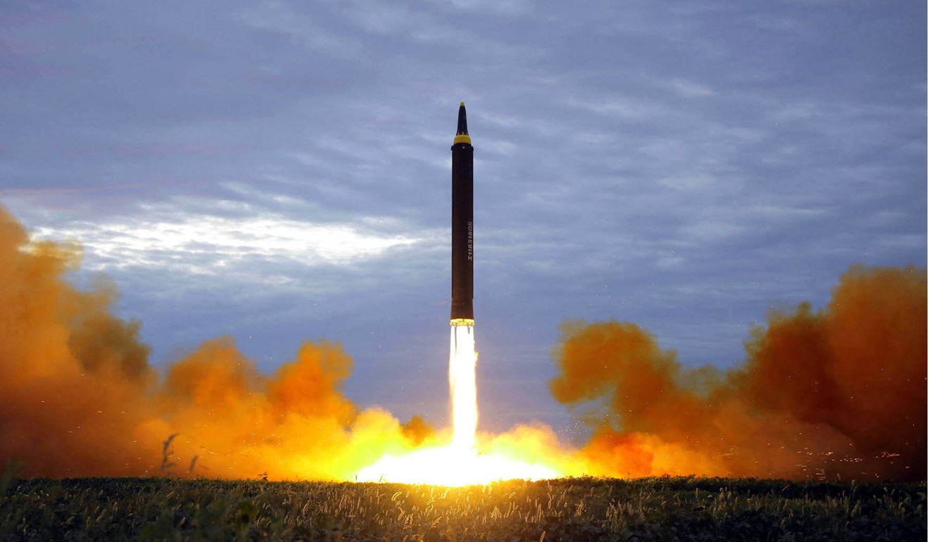 North Korea tests a Hwasong-12 intermediate range missile. Analysts say Pyongyang is seeking new sources of income to thwart sanctions on its nuclear programme. Photo: AP