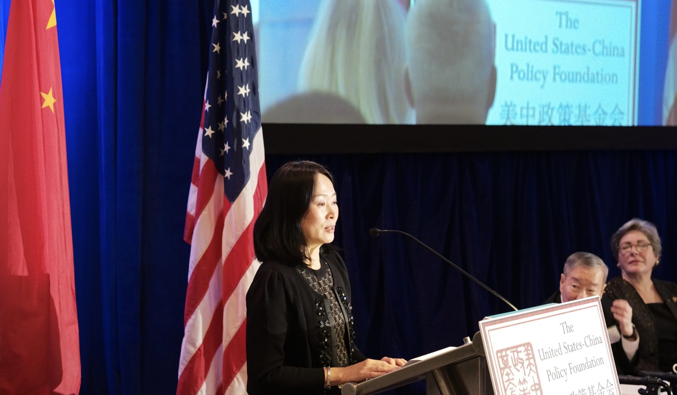 ﻿South China Morning Post Editor-in-Chief Tammy Tam addresses the audience after accepting the global media leadership award from ambassador Gary Locke.