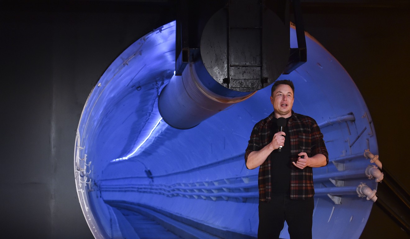 Elon Musk speaks during an unveiling event for the test tunnel. Photo: AFP