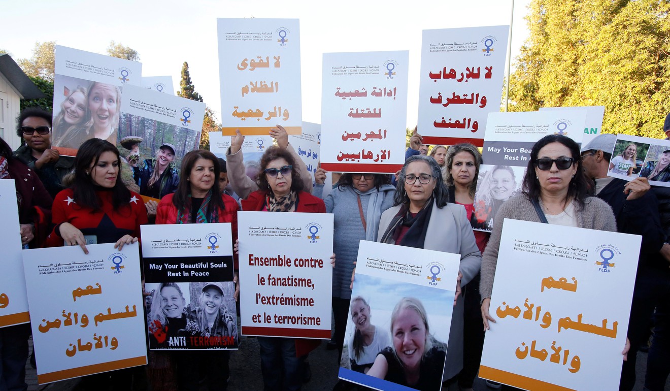 Moroccans gather in front of Denmark's embassy in Rabat to honour Maren Ueland from Norway and Louisa Vesterager Jespersen from Denmark, who were killed in Morocco. Photo: Reuters