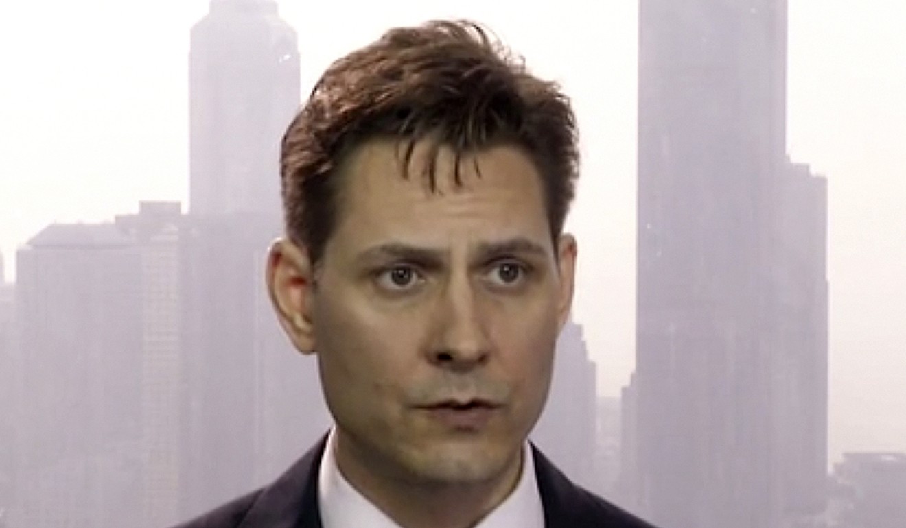 In this file image made from a video taken on March 28, 2018, Michael Kovrig, an adviser with the International Crisis Group, speaks during an interview in Hong Kong. Photo: AP