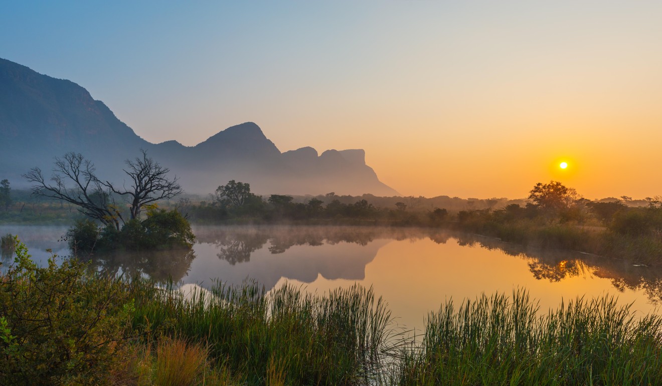 Sunrise inside the Entabeni Safari Game Reserve, Limpopo province, South Africa. Photo: Alamy