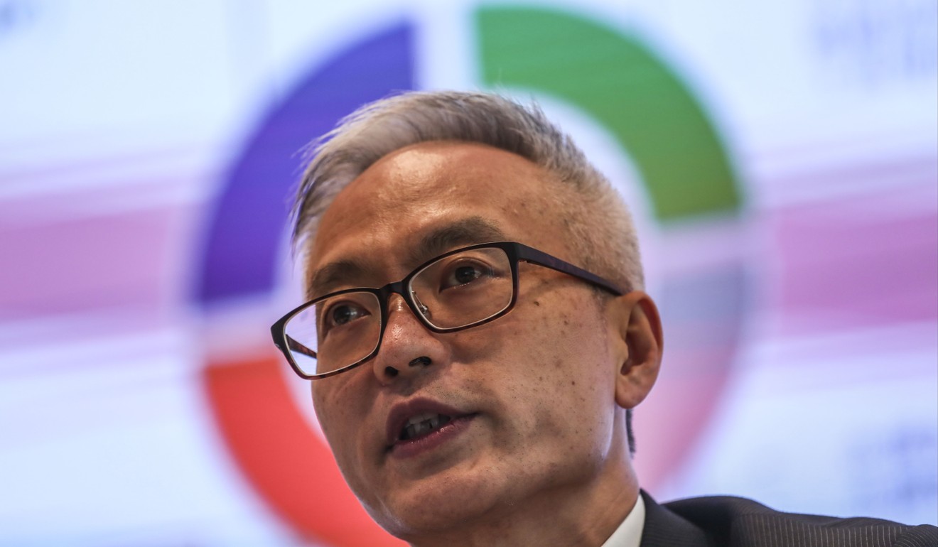 Hong Kong Monetary Authority deputy chief executive Howard Lee attends a press conference on the launch of the Faster Payment System at Two International Finance Centre. Photo: Jonathan Wong