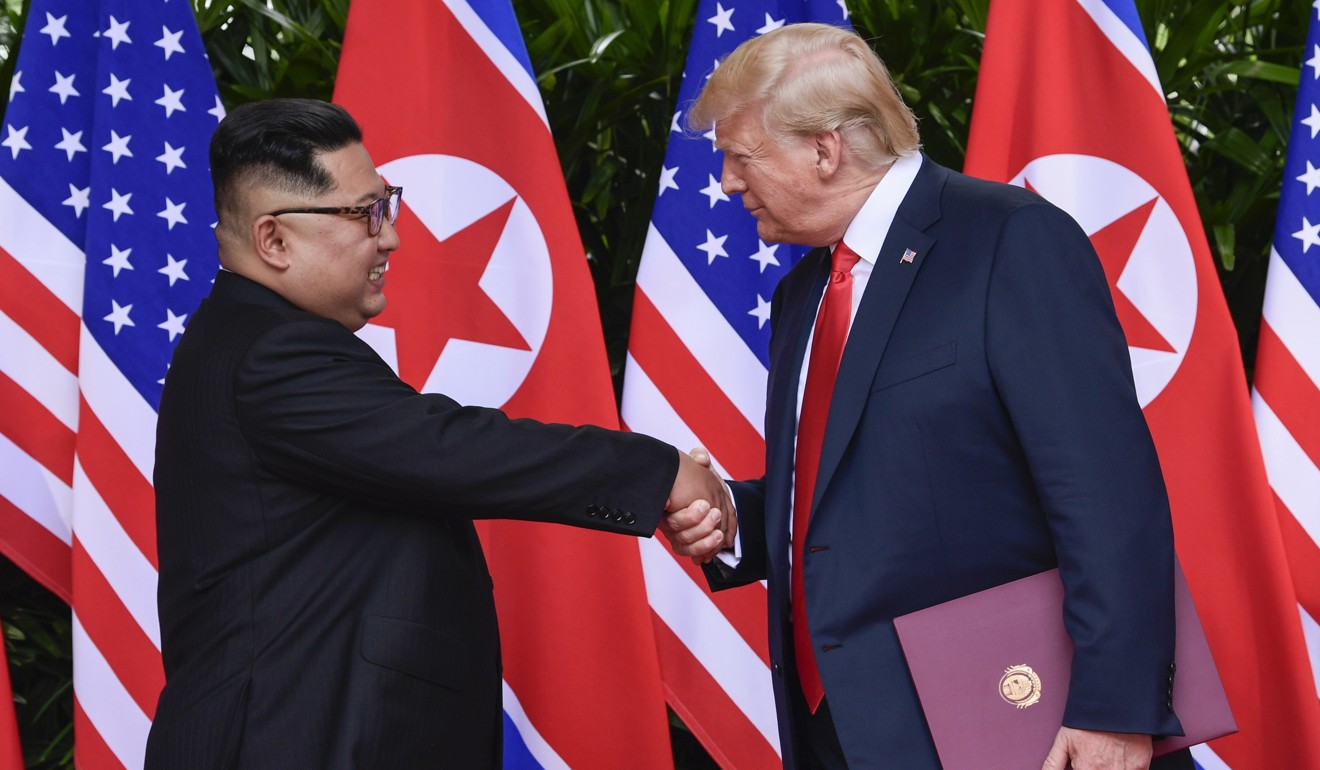 North Korean leader Kim Jong-un and US President Donald Trump shake hands at the conclusion of their meetings in Singapore in June 2018. Photo: AP