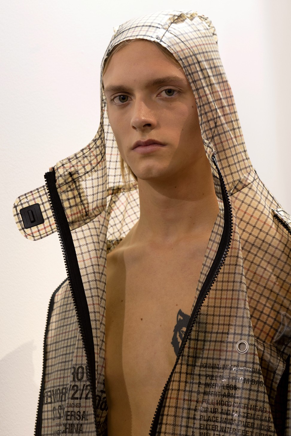 A model wears a creation from the fall/winter 2019-20 men’s collection by Chinese designer Shangguan Zhe for Sankuanz backstage during Paris Fashion Week. Photo: EPA-EFE