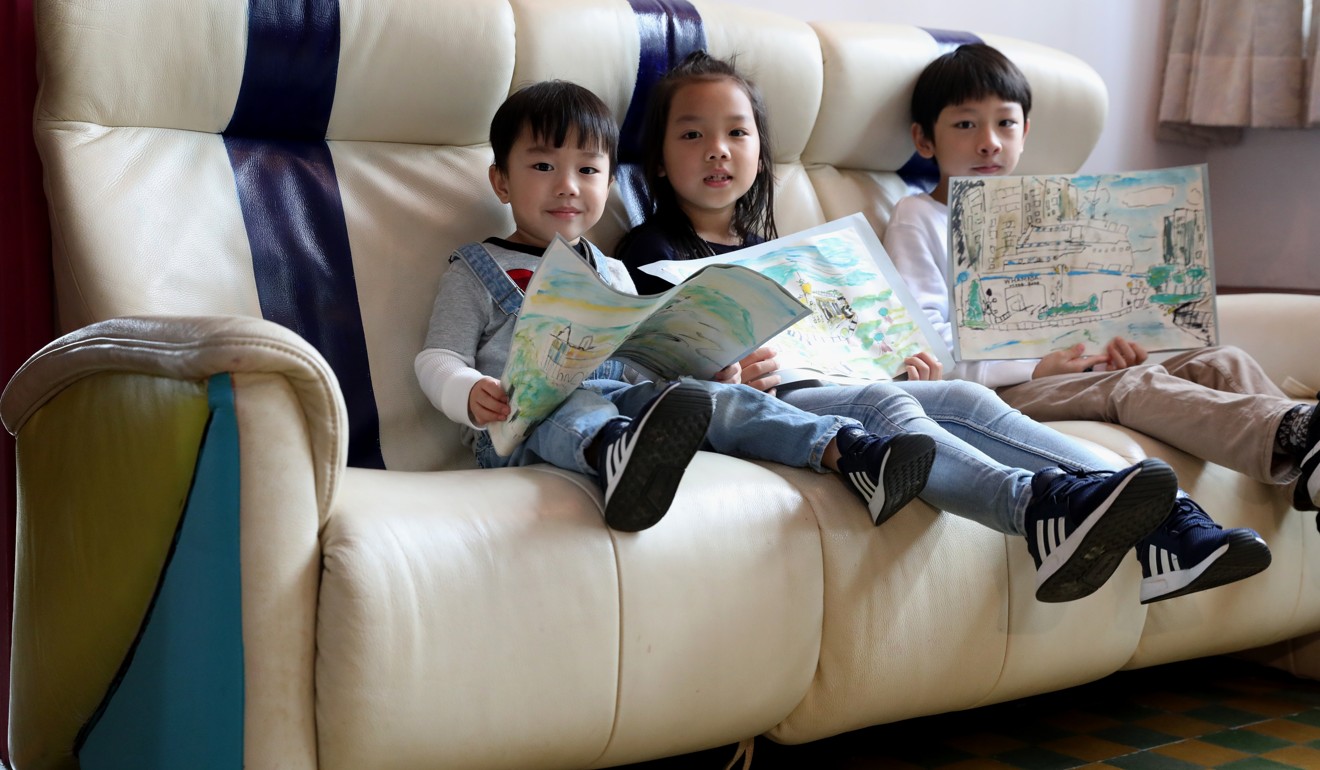 (From left) Ryan Zhong, three, with his sister, Jenny, six, and Jonathan Yeung, 10, in the light home flat they share. Photo: Nora Tam