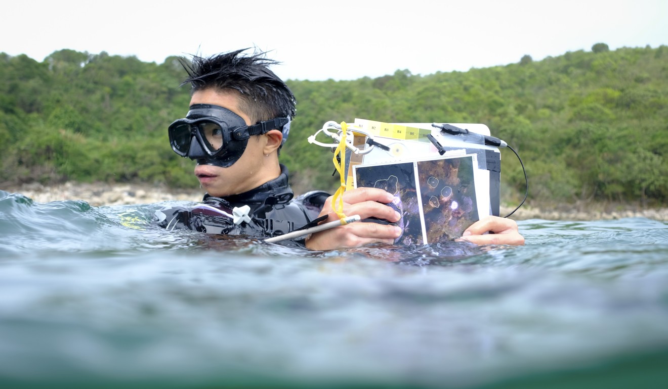 Pei prepares to check the coral nursery. Picture: James Wendlinger