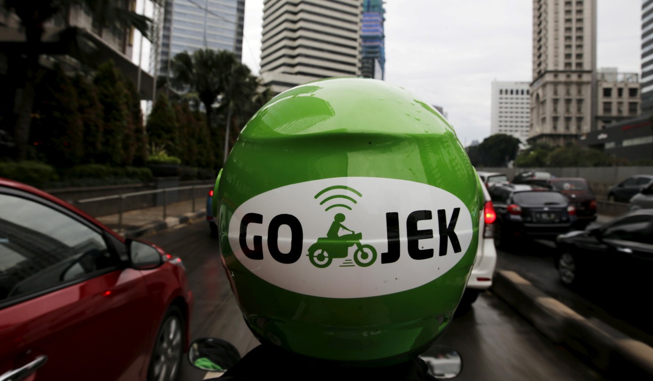A Go-Jek driver in Jakarta, Indonesia. Photo: Reuters