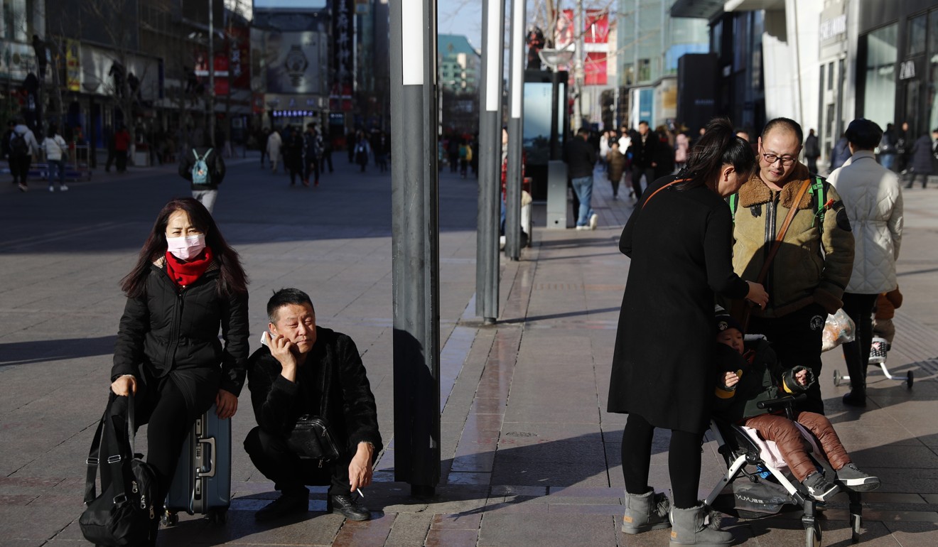 Chinese people rest in Wangfujing Street in Beijing, China, 21 January 2019. China's gross domestic product (GDP) grew by 6.6 per cent in 2018, according to a report of the National Bureau of Statistics issued on 21 January 2019. Photo: EPA-EFE