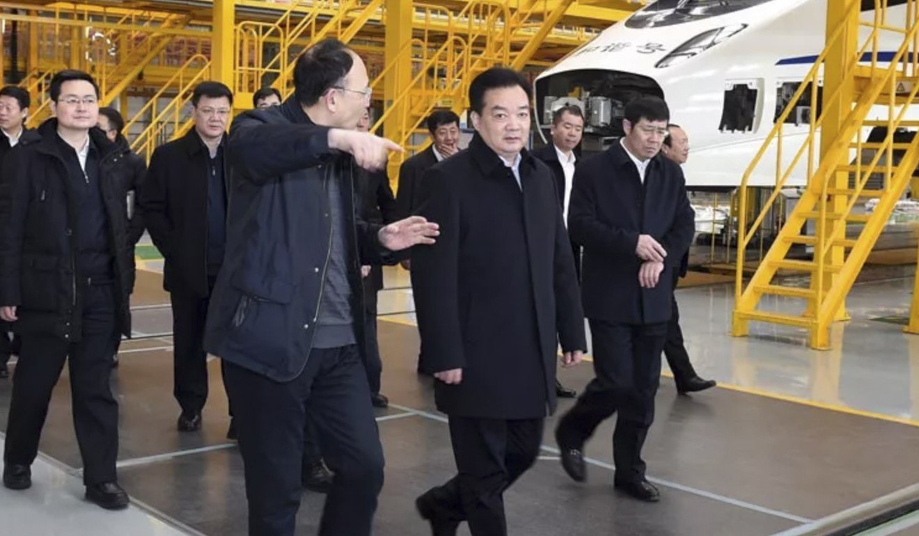 Wang Junzheng (front, right), has been on a fast track of rotation and promotion since the beginning of his political career. Photo: Xinhua