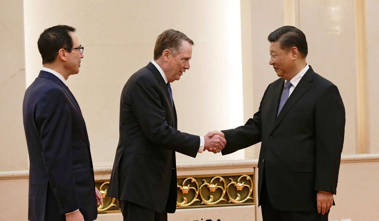 US Trade Representative Robert Lighthizer shakes hands with Chinese President Xi Jinping as US Treasury Secretary Steven Mnuchin looks on. Photo: Reuters