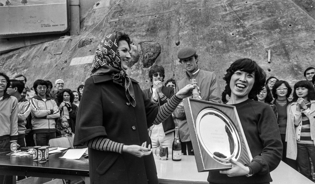 Yuko Hasegawa (right) receives her trophy from Mrs M. J. Pridham after winning the women's title in the Inter-Hong Cross Country Run on the Peak in 1979. Photo: SCMP