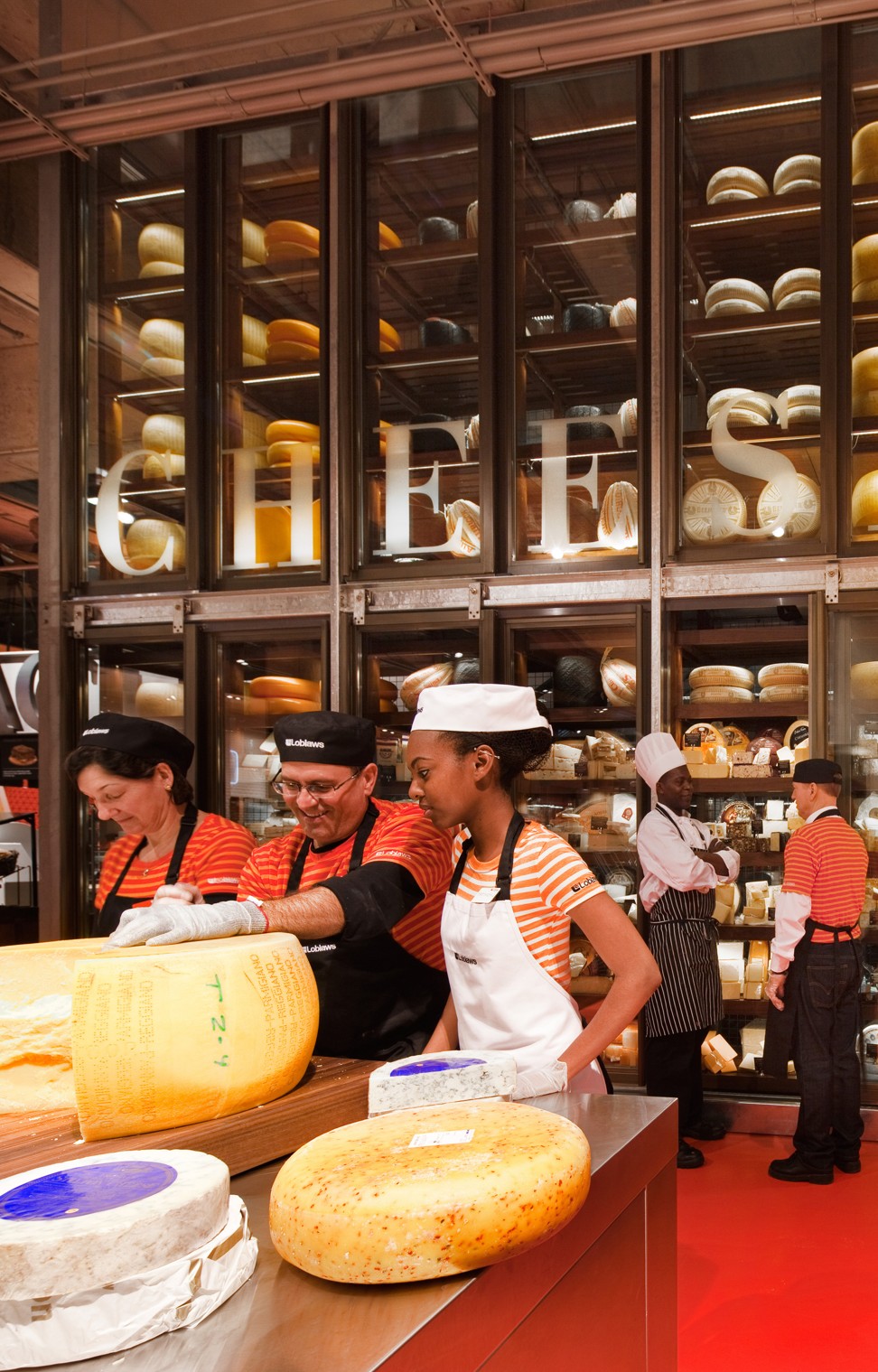 Designed by Landini Associates, Loblaws Maple Leaf Gardens, Toronto, Canada, is still visited by retailers from all over the world as the benchmark in supermarket design. The cheese wall at Loblaws is the tallest in the world. Photo: Trevor Main, courtesy of Landini Associates