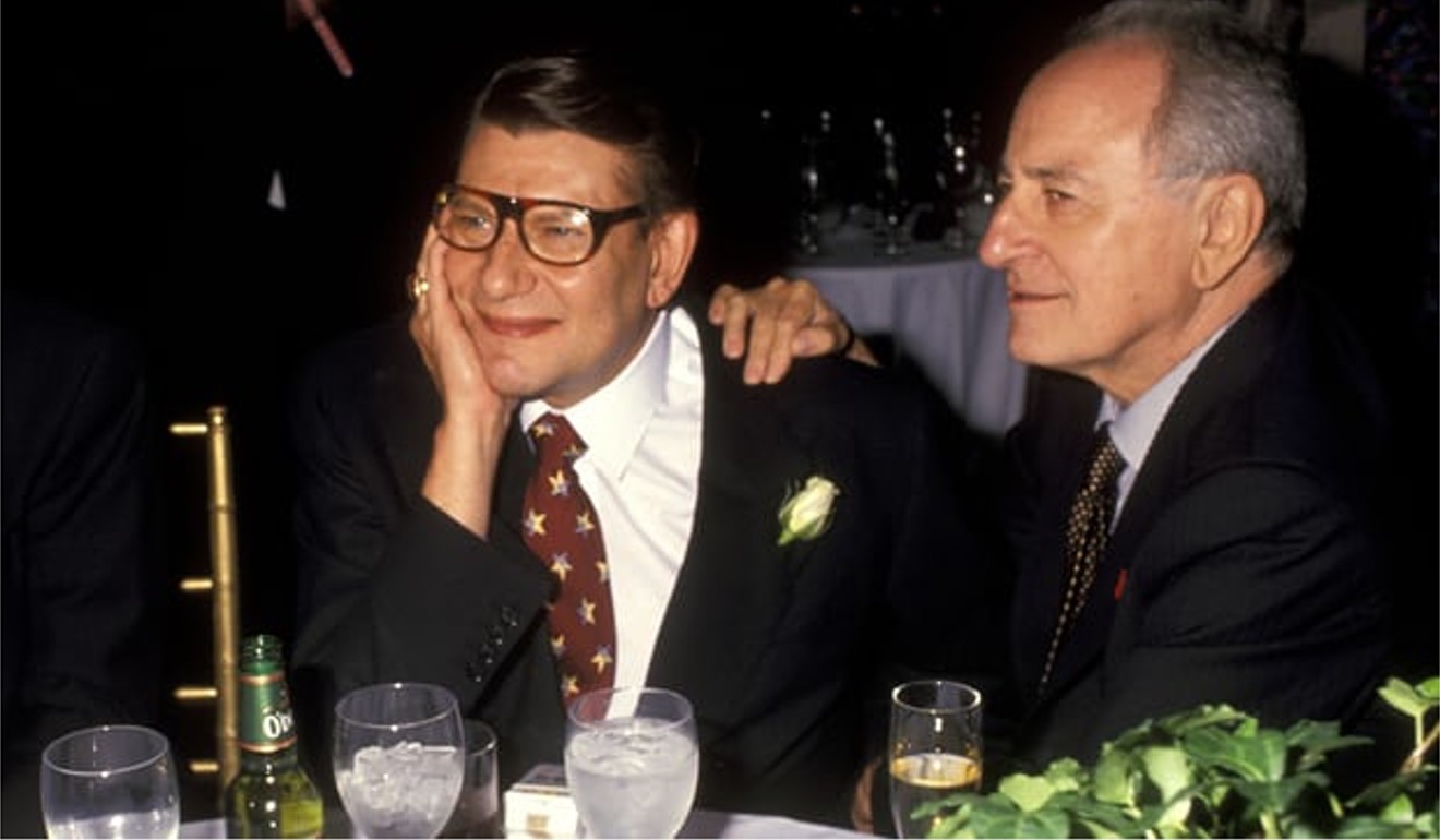 Yves Saint Laurent (left) and Pierre Berge at a launch party for the designer’s perfume ‘Champagne’ in September 1994. Photo: Ron Galella/WireImage