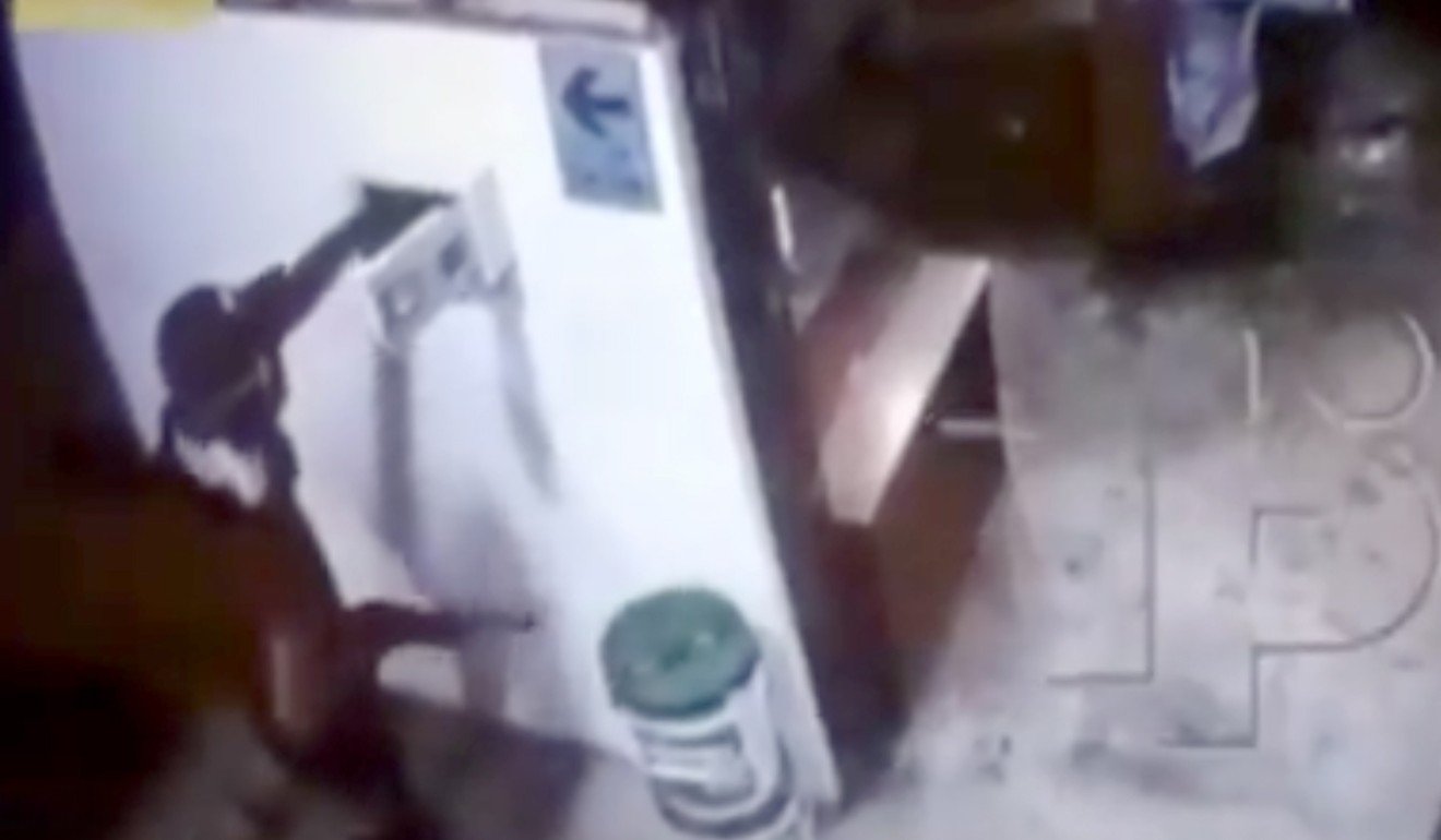 A CCTV screen grab shows a robber during Thursday’s attack. Photo: Handout