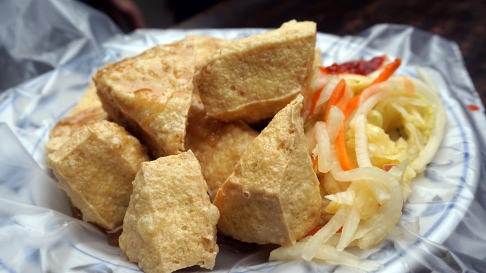Stinky tofu absorbs lots of oil when cooked, which can pose health risks if eaten regularly. Photo: Shutterstock
