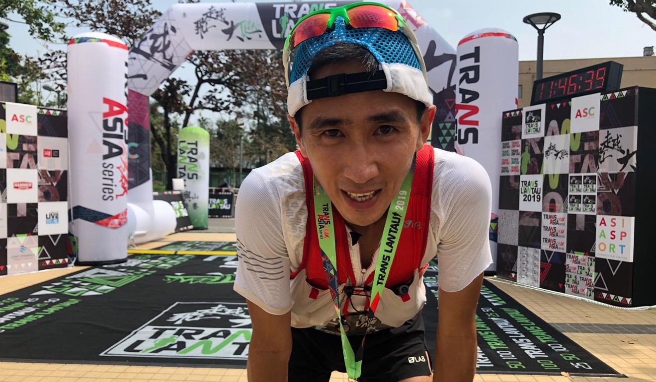 Mainland runner Deng Guomin takes a breather after finishing third in the men’s 100km race. Photo: Kartus Kong