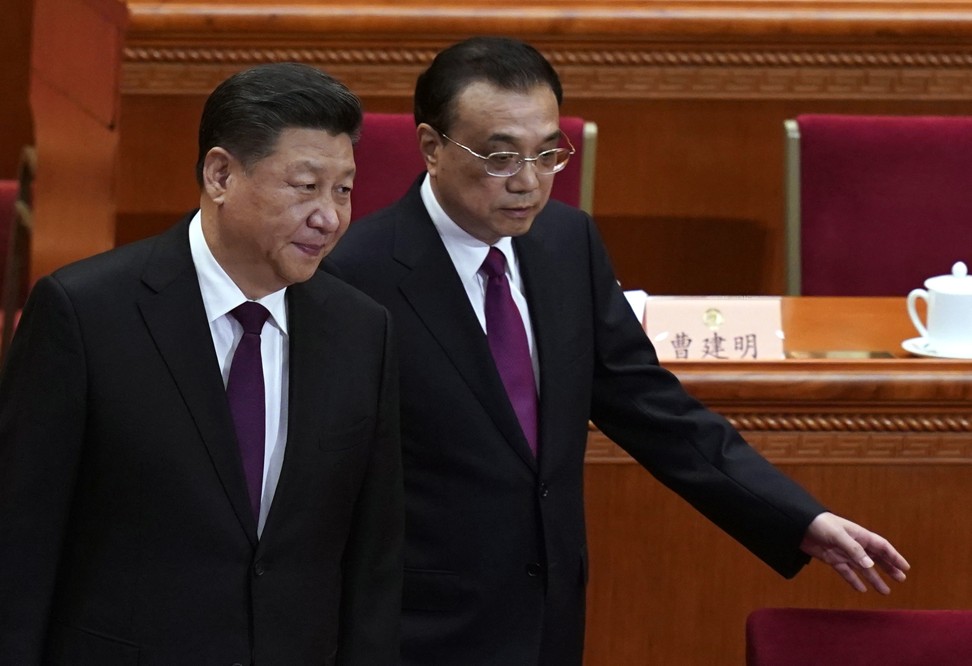 Chinese President Xi Jinping (left) and Chinese Premier Li Keqiang arrive for the opening of the Second Session of the 13th Chinese People's Political Consultative Conference National Committee at the Great Hall of the People in Beijing. Photo: EPA