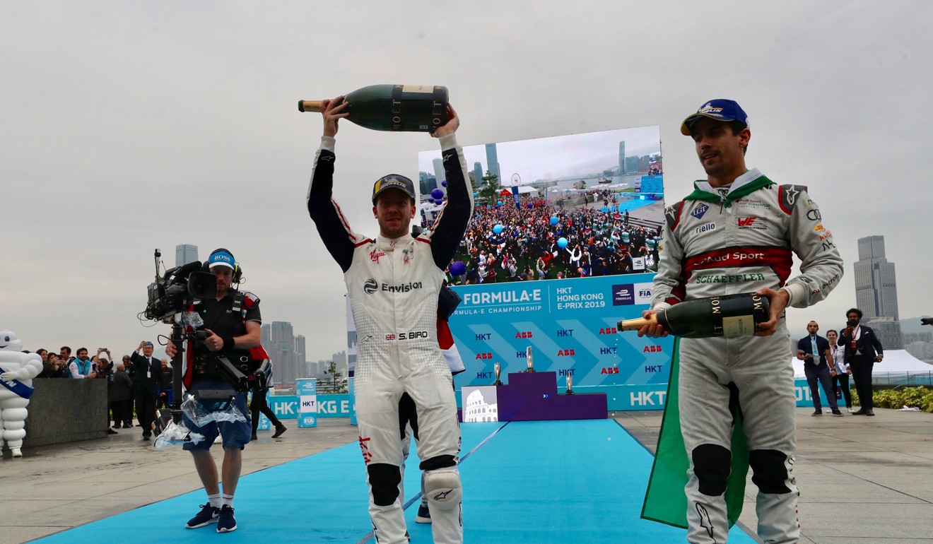 Sam Bird sprays champagne as he celebrates his Hong Kong E-Prix win, but stewards later took the victory away from him. Photo: Sam Tsang