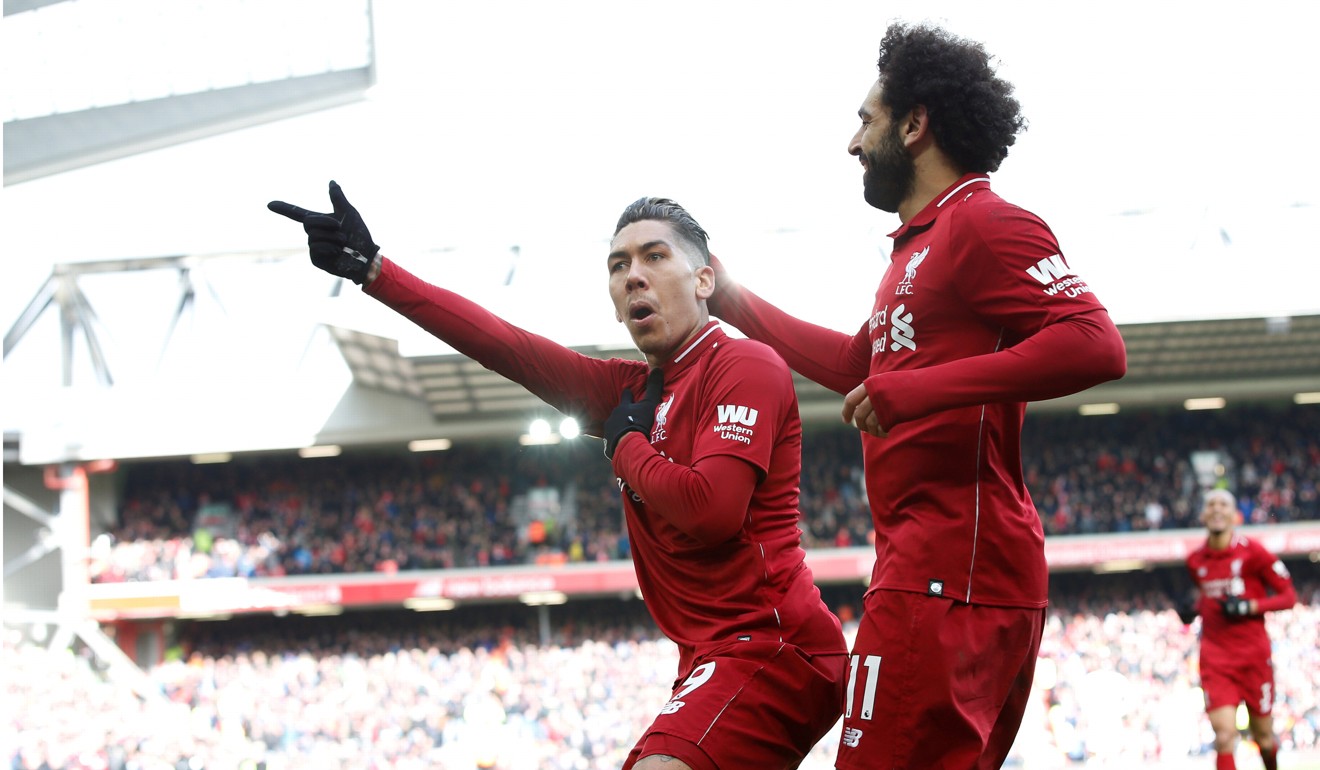 Liverpool’s Roberto Firmino celebrates one of his two goals against Burnley. Photo: Reuters