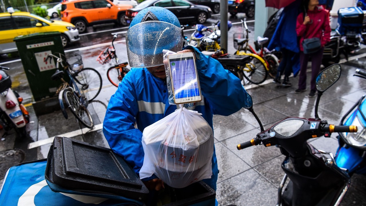 Users of food delivery services grew 135 million in a year, according to a CNNIC report. (Picture: AFP)
