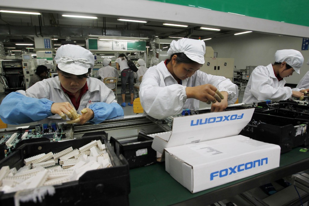 A production line at the Foxconn complex in Shenzhen in 2010 (Picture: AP Photo)