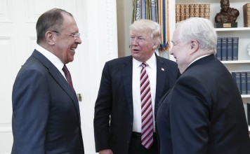 A handout photo made available by the Russian Foreign Ministry shows US President Donald Trump speaking with Russian Foreign Minister Sergei Lavrov (L) and Russian Ambassador to the US Sergei Kislyak during a meeting at the White House. Photo: AFP