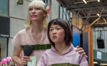 Tilda Swinton and Ahn Seo-hyun in Okja. Photo: Barry Wetcher, Netflix