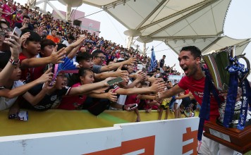 Kitchee’s Fernando Pedreira celebrates with fans after winning the Hong Kong Premier League. They will represent Hong Kong in the AFC Champions League next season. Photo: Jonathan Wong