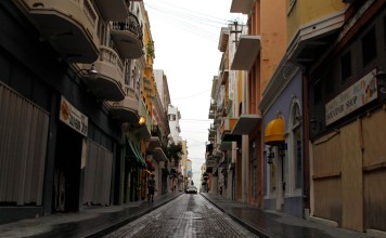 A once crowded and busy street is seen empty with closed down businesses in San Juan, Puerto Rico on November 7, 2017. A report said about 114,000 to 213,000 Puerto Rican residents will leave the island annually because of Hurricane Maria. Photo: Agence France-Presse