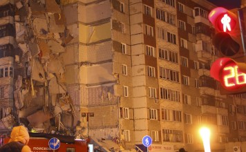 The damaged block of flats after a portion collapsed in the town of Izhevsk, Russia, on November 9, 2017. Three people died in the accident. Photo: Reuters