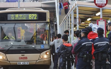 Police and extra KMB staff were on hand after the races. Photo: Felix Wong