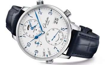 Glashütte Original. The Senator Cosmopolite, in stainless steel, has dark blue printed Arabic minute numerals and blue hands against a matte white lacquered dial, HK$175,000