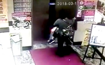 A CCTV image that appears to show the woman entering the building with the boy. Photo: Handout.