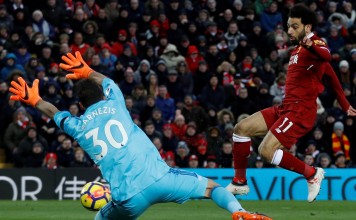Liverpool’s Mohamed Salah scores their second goal of four against Watford. Photo: Reuters
