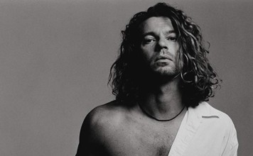 Michael Hutchence’s last years were turbulent and complicated, which his sister, in her new book, blames partly on a brain injury the Australian rock musician suffered in 1992.