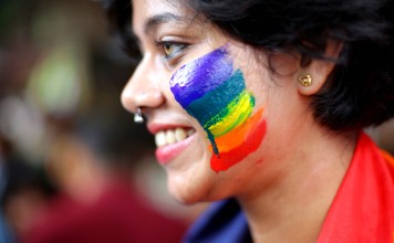 An LGBTI activist celebrates India’s overturning of a law criminalising gay sex. The Indian court’s verdict has inspired campaigners seeking a similar move in Singapore. Photo: EPA