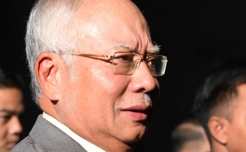Malaysia’s former prime minister Najib Razak is facing a painful crawl towards his day in court as authorities continue to open fresh probes to find out the full extent of his involvement in the 1MDB case. Photo: AFP
