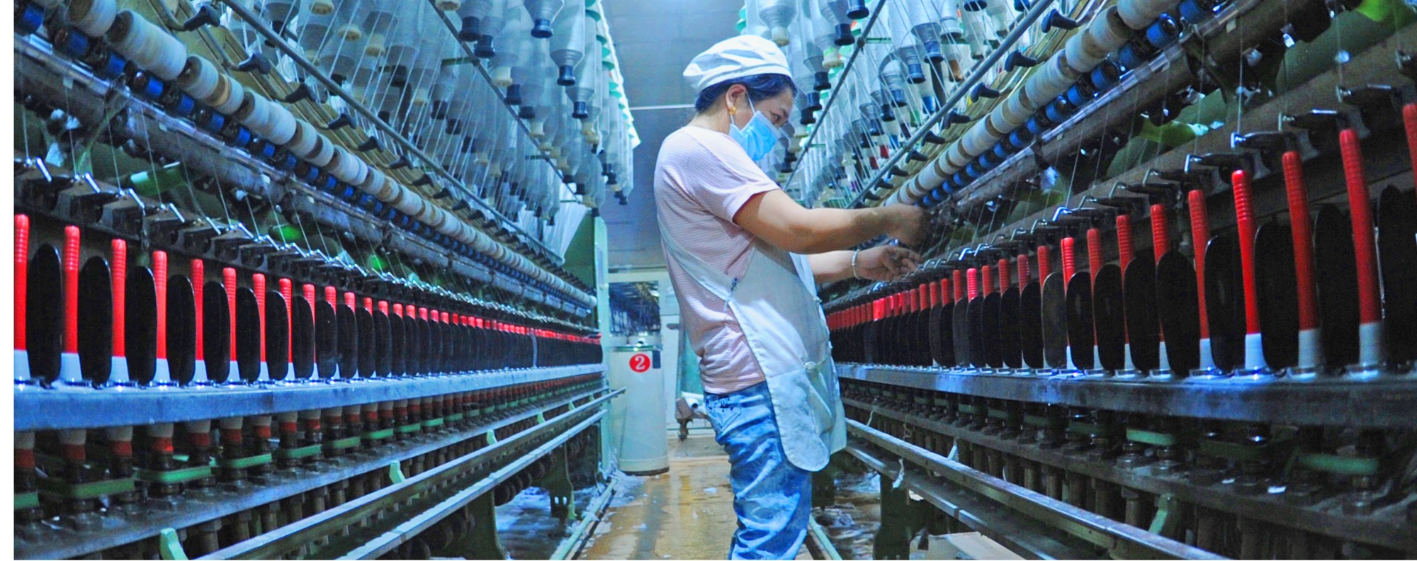 A worker at a textile enterprise in Lianyungang City. Photo: Xinhua